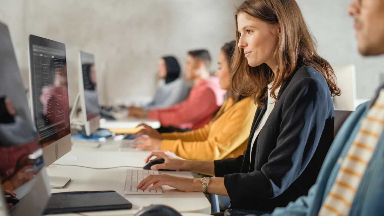 Students working at computers in a lab
